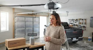 Homeowner using voice commands with a smart speaker to operate a connected smart garage door opener